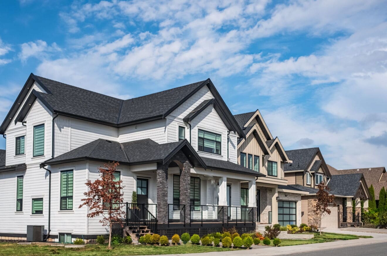 Modern two-storey detached homes showcasing housing styles found in Niagara Falls neighbourhoods.