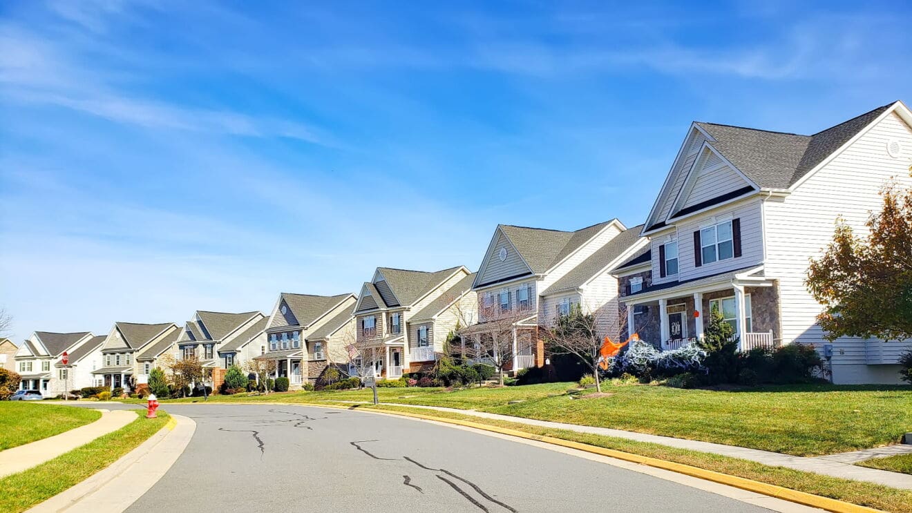 Quiet residential street with detached houses similar to those in Niagara Falls neighbourhoods.